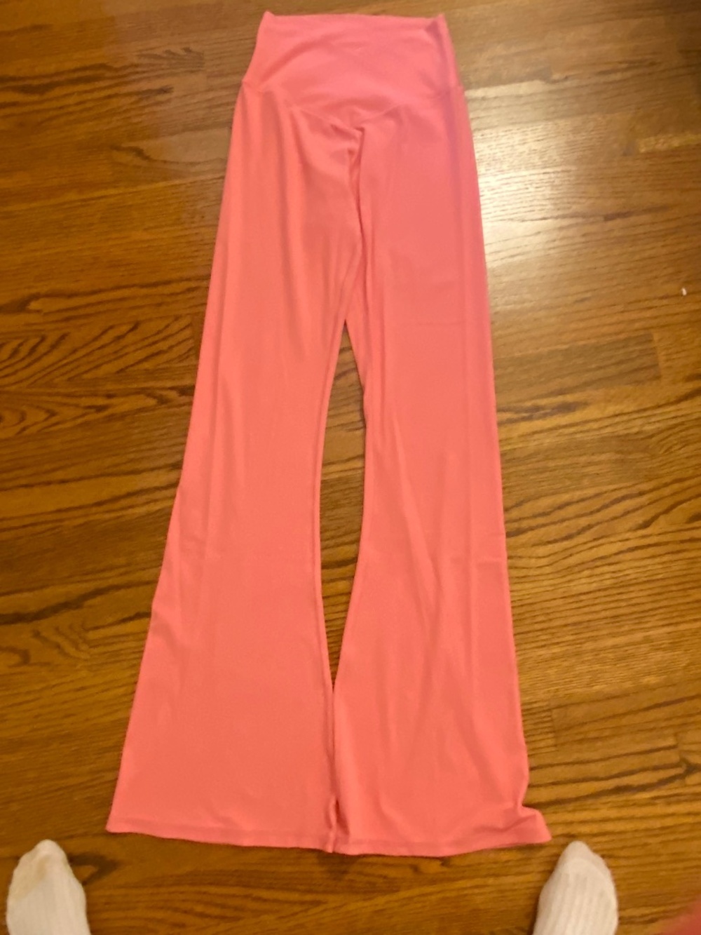 Bright pink crossover flare leggings